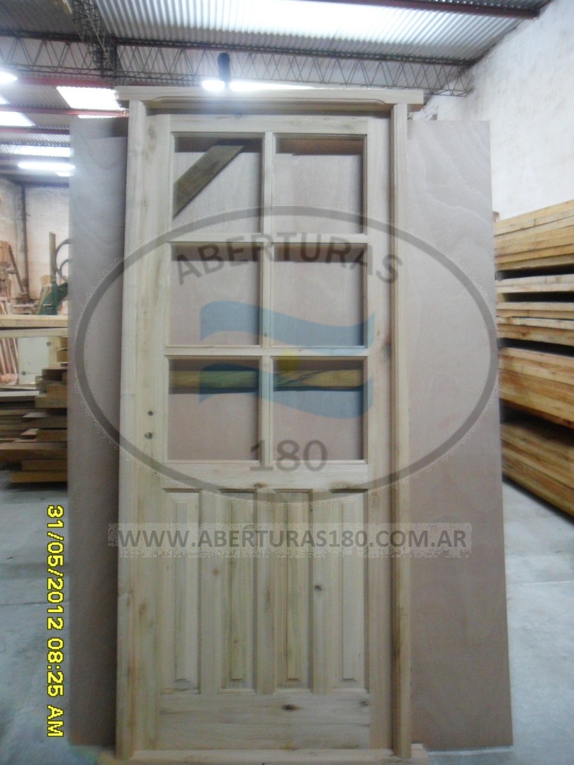 Puerta 0.80 x 2.00 4 tableros V.R en saligna.